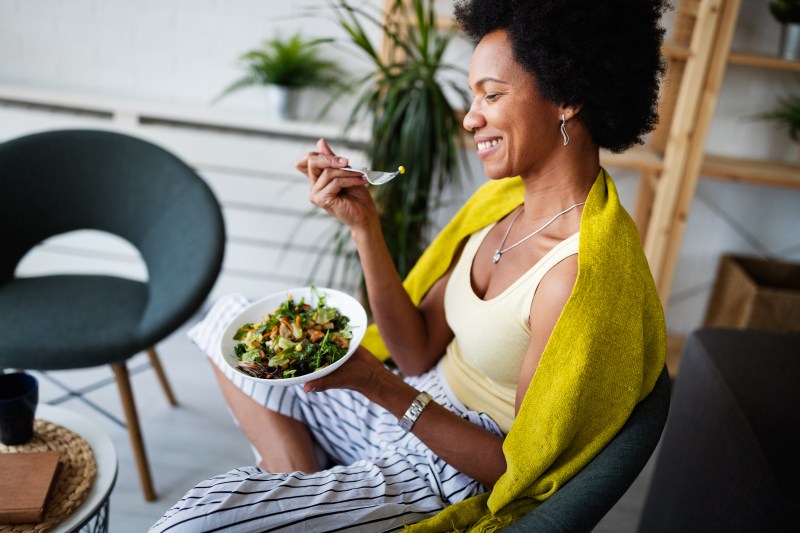 Woman eating a healthy salad