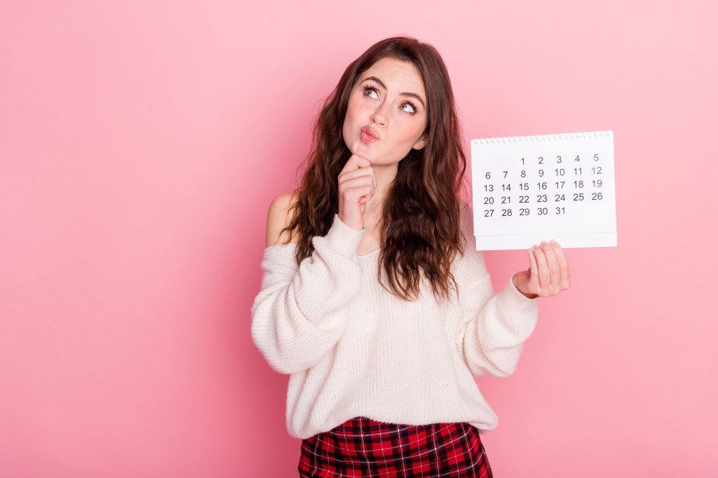 Woman holding a calendar