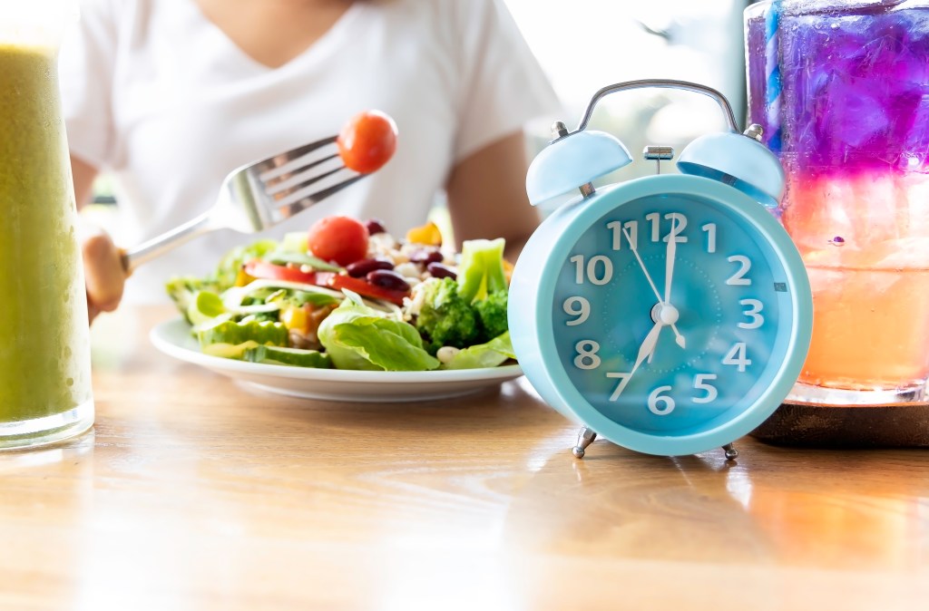 Woman eating a scheduled meal