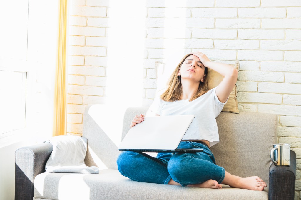Woman getting tired while working